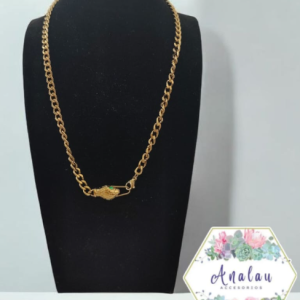 COLLAR SEROIENTE DORADO OJS VERDES