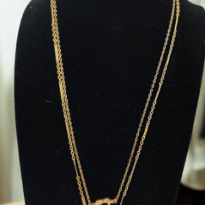 COLLAR DOBLE CORAZON NUDO