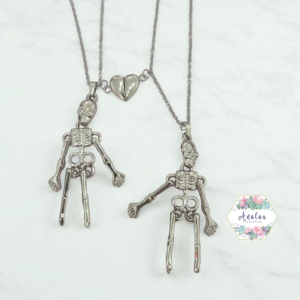 COLLAR DE PAREJA DE CALAVERAS UNIR CORAZON