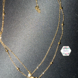 COLLAR DOBLE PERLA CONCHA ESTRELLA DORADO