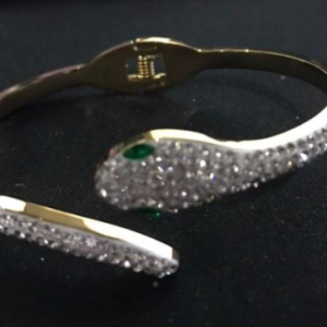PULSERA SERPIENTE DORADA OJOS VERDE INCRUSTADA