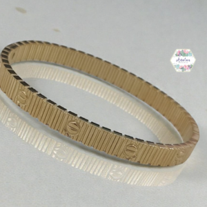 PULSERA DORADA CARRTIER DORADA RAYAS