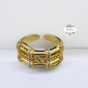 ANILLO ANCHO DORADO CON PIEDRAS BOLITAS