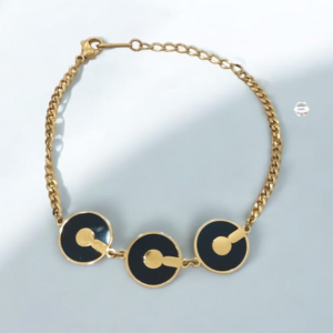 PULSERA 3 CIRCULOS NEGROS DORADOS LISOS