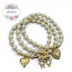 TRES PULSERAS BLANCAS CON DORADO CON DIJE DE CORAZONS Y NIÑO/NIÑA